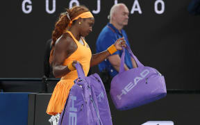 Coco Gauff throws walks off the court after her quarter-final loss to Ukraine's Elina Svitolina at the Australian Open.