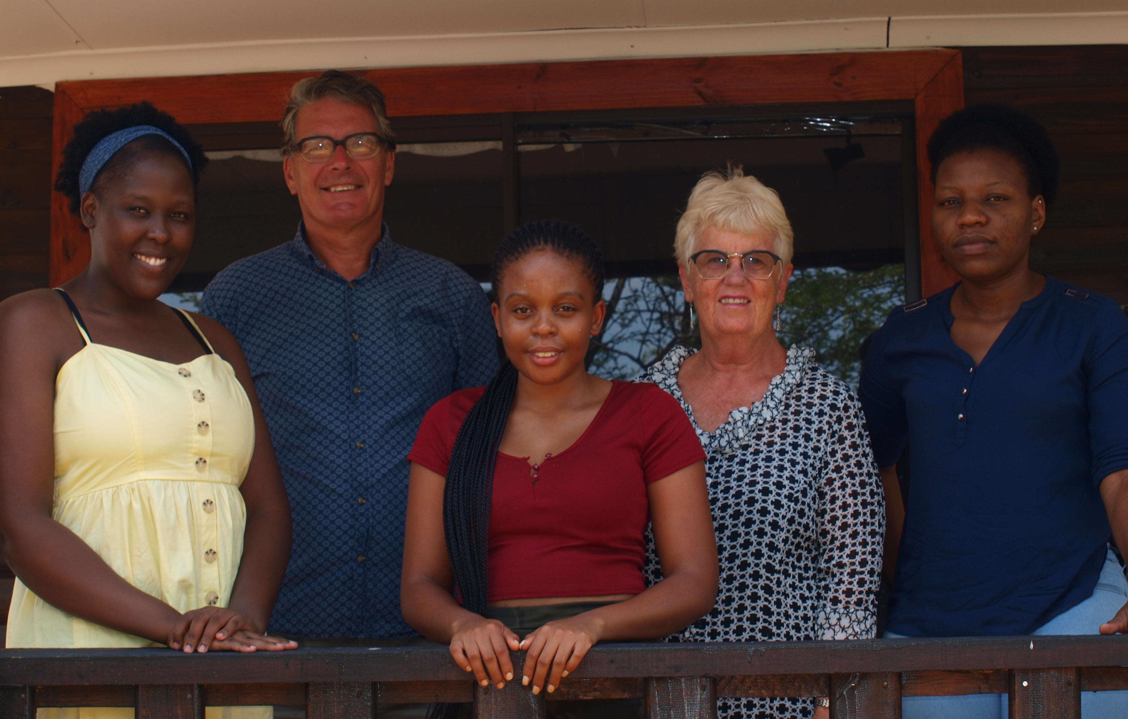 New Zealanders Graeme and Gillian Bremner with members of their Self Drive Tours Botswan team.