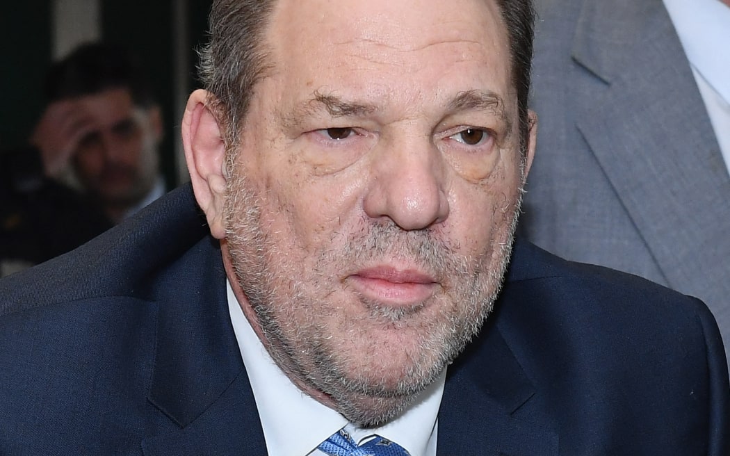(FILES) Harvey Weinstein arrives at the Manhattan Criminal Court, on February 24, 2020, in New York City. New York's highest court on April 25, 2024, overturned Hollywood producer Weinstein's 2020 conviction on sex crime charges and ordered a new trial. In their decision, judges cited errors in the way the trial had been conducted, including admitting the testimony of women who were not part of the charges against him. "Order reversed and a new trial ordered," the judges wrote. (Photo by Angela Weiss / AFP)