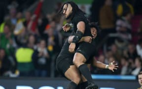 New Zealand’s Ma'a Nonu celebrates scoring a try with Julian Savea