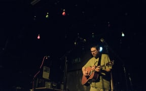 Samuel Flynn Scott perform at the Renters United fundraiser
