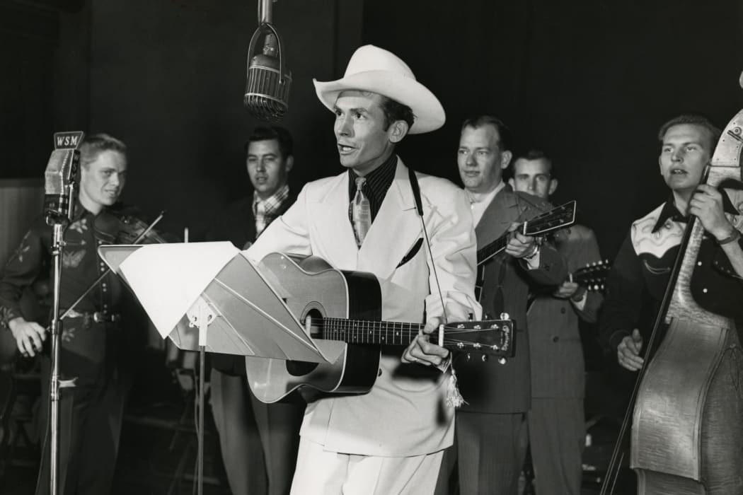 Hank Williams at the WSM radio studio, Nashville, c.1948.
Credit: Les Leverett Collection