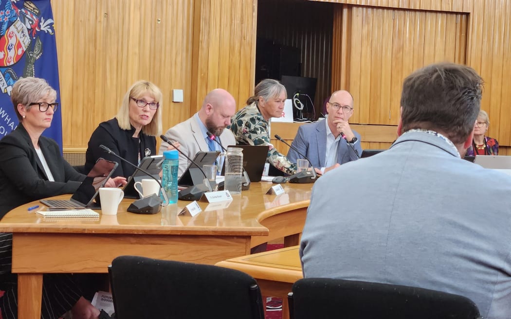 People at the council meeting table, at Whanganui District Council.