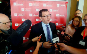 Labour Party finance spokesperson Grant Robertson gives details at the release of his final Future of Work report.
