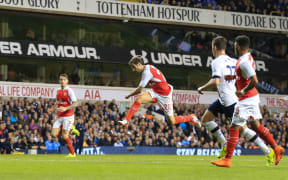 Arsenal midfielder Mathieu Flamini scores against Spurs 2015.