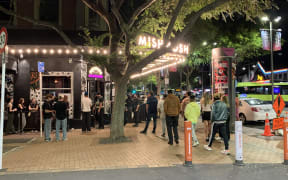 Courtenay Place in Wellington is usually busy on Friday and Saturday nights with large crowds of people on the footpaths and packed venues.