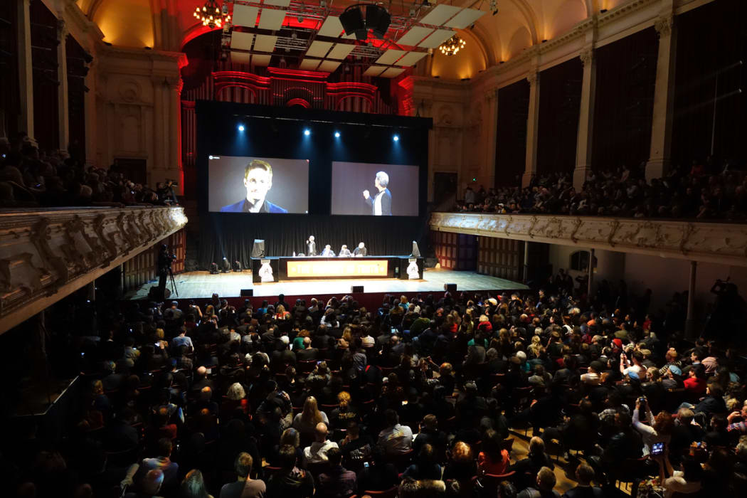 Edward Snowden appears via internet link at Auckland's Town Hall.