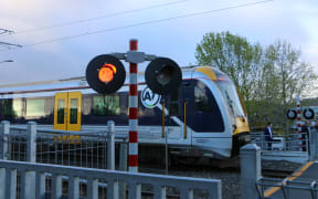 Railway crossing at Glen Eden train station.