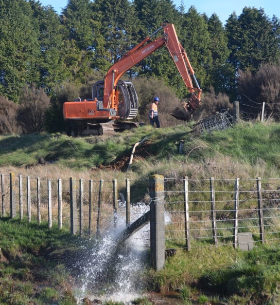 Contractors draining settling ponds that form part of the Raetihi water supply.
