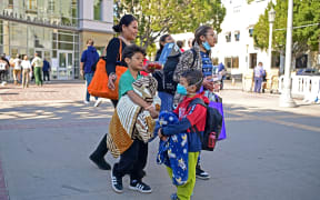 People arrive at an evacuation center in the Pasadena Convention Center in Pasadena, California, as they flee wildfires in the Los Angeles area on January 10, 2025. Massive wildfires that engulfed whole neighborhoods and displaced thousands in Los Angeles have killed at least 10 people, authorities said, as California's National Guard soldiers readied to hit the streets to help quell disorder.
News of the growing toll, announced late Thursday January 9 by the Los Angeles County Medical Examiner, came as swaths of the United States' second-largest city lay in ruins. (Photo by Agustin PAULLIER / AFP)