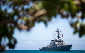 The USS Higgins sails into Joint Base Pearl Harbor-Hickam in support of Rim of the Pacific (RIMPAC) 2012 exercise on Friday, June 29, 2012 in Pearl Harbor, Hawaii.  Twenty-two nations, 42 ships, six submarines, more than 200 aircraft and 25,000 personnel will participate in the biennial RIMPAC exercise from June 29 to August 3, in and around the Hawaiian Islands.  AFP PHOTO / Kent NISHIMURA (Photo by Kent Nishimura / AFP)