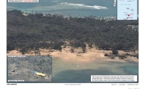 An aerial photo taken from a New Zealand Defence force P-3 Orion on January 16, 2022 shows Mango island in Tonga with no houses left after impact from a tsunami. The inset image shows some makeshift shelters.