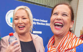 Deputy First Minister of Northern Ireland, and Irish republican Sinn Fein party Northern Leader Michelle O'Neill  reacts with part Leader Mary Lou McDonald.