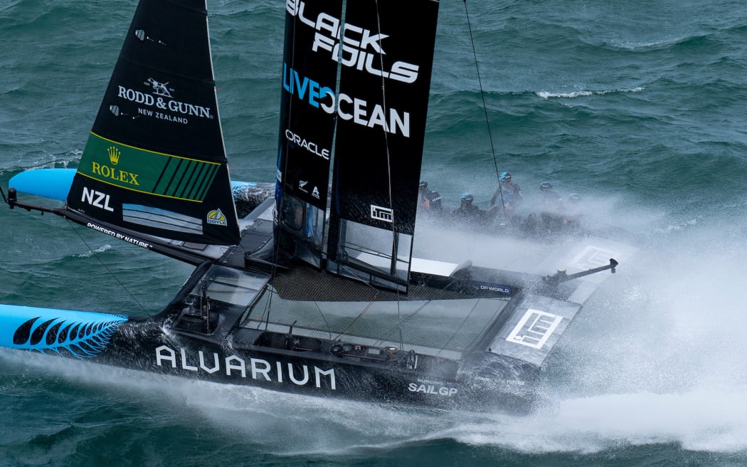 New Zealand SailGP Team helmed by Peter Burling in action as they hit a wave during racing on Race Day 2 of The Rolex SailGP 2025 Championship ITM New Zealand Sail Grand Prix in Auckland, New Zealand. Sunday 19 January 2025. Photo: Bob Martin for SailGP. Handout image supplied by SailGP