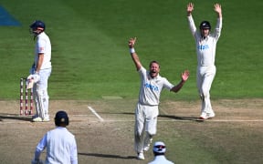 Neil Wagner of New Zealand appeals successfully as James Anderson of England is caught behind by Tom Blundell and New Zealand beat England at the Basin Reserve, 2023.