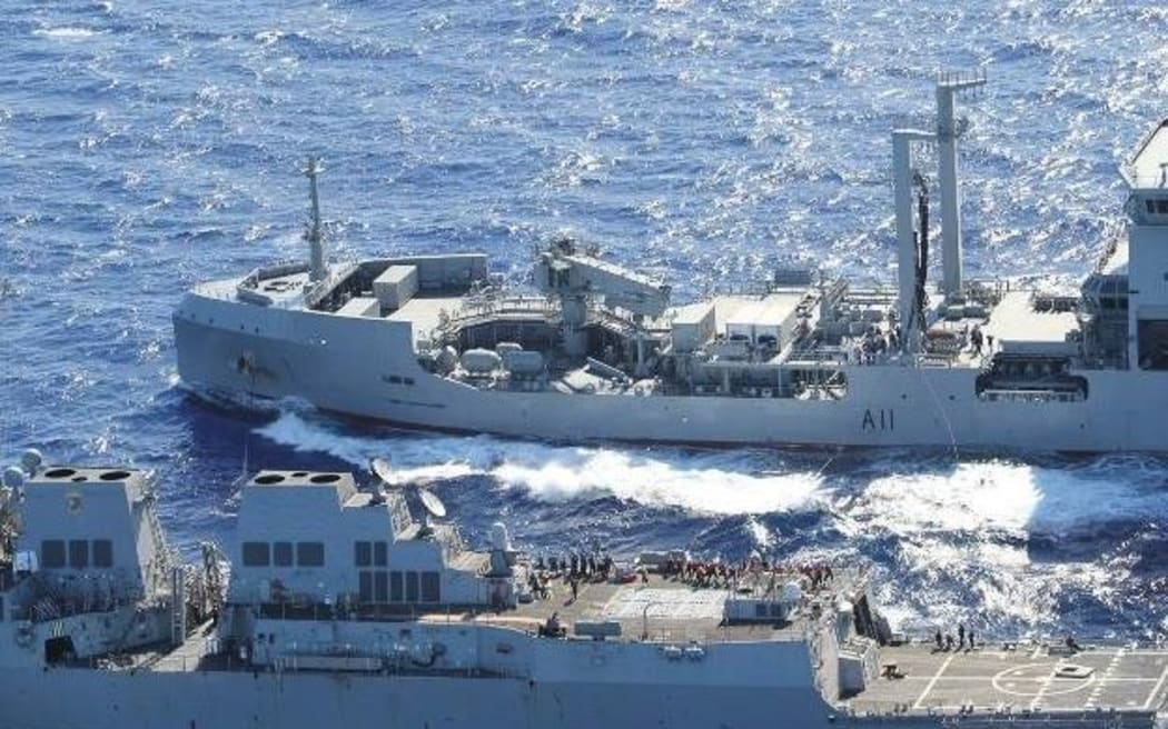 USS SAMPSON conducts a replenishment at sea with the New Zealand oiler HMNZS Aotearoa (A11) as they support disaster relief efforts in Tonga.