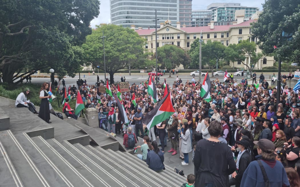 Hundreds of people gathered outside Parliament's steps to call on the government to demand an immediate and permanent ceasefire in Gaza on 5 December, 2023.