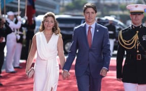 (FILES) LOS ANGELES, CALIFORNIA - JUNE 08: Prime Minister Justin Trudeau of Canada arrives alongside his wife Sophie Gregoire Trudeau to the Microsoft Theater for the opening ceremonies of the IX Summit of the Americas on June 08, 2022 in Los Angeles, California. Canadian Prime Minister Justin Trudeau announced August 2, 2023 that he and his wife of 18 years, Sophie Gregoire-Trudeau, are separating. (Photo by Anna Moneymaker / AFP)