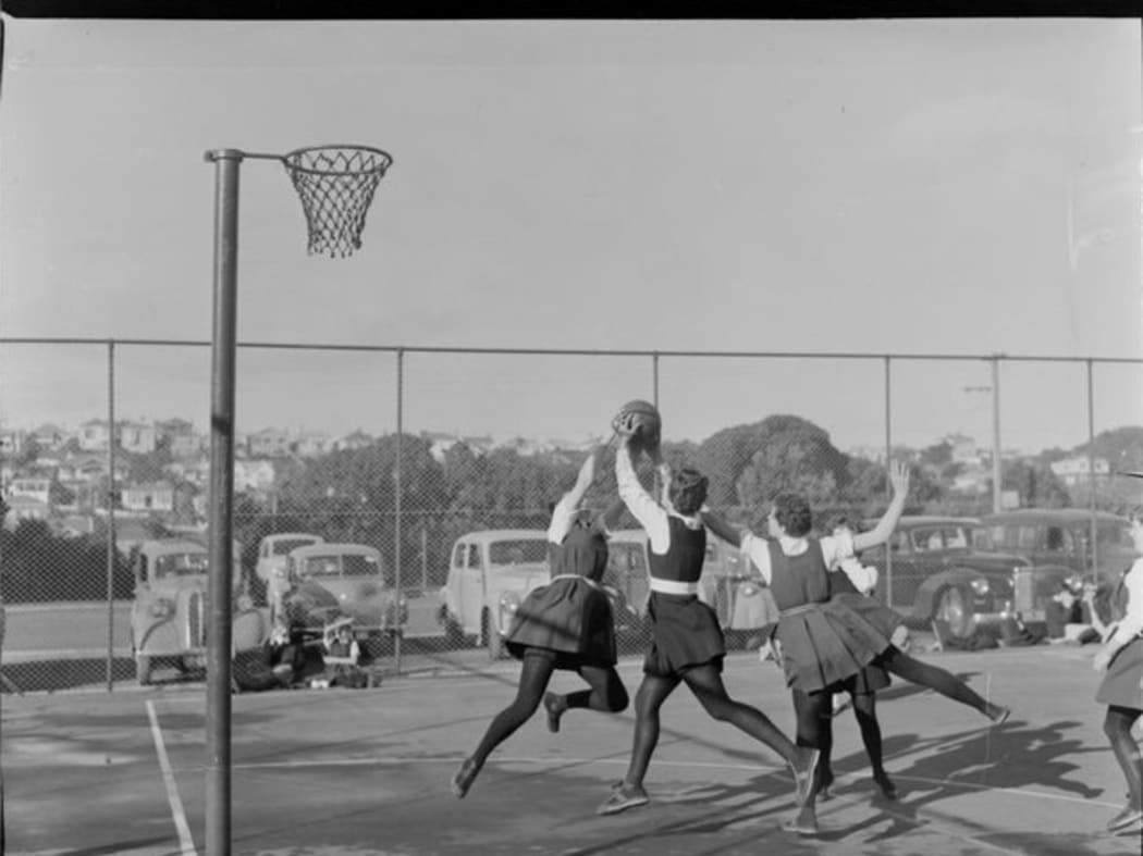 Action in gym slips and stockings, Tech Old Girls vs St Mary’s Wellington, 1955