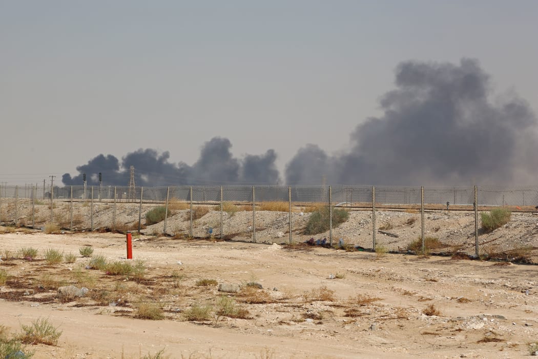 Smoke billows from an Aramco oil facility in Abqaiq about 60km southwest of Dhahran in Saudi Arabia's eastern province on September 14, 2019.