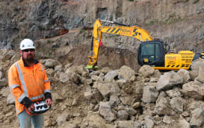 Vaughan Breen operates his digger by remote control at Dean's Head.