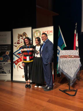 Dr Maxine Ronald and Prof Kelvin Kong onstage with Dr Rochelle Love at LIME