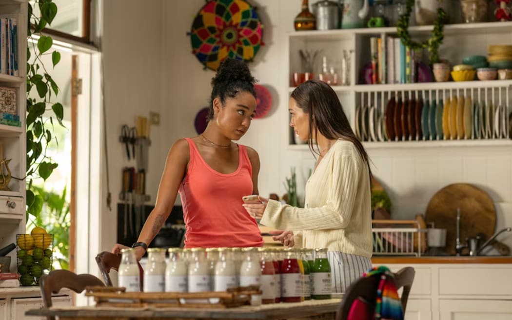 Aisha Dee and Alycia Debnam-Carey work together to spruik a juice brand in Apple Cider Vinegar.
