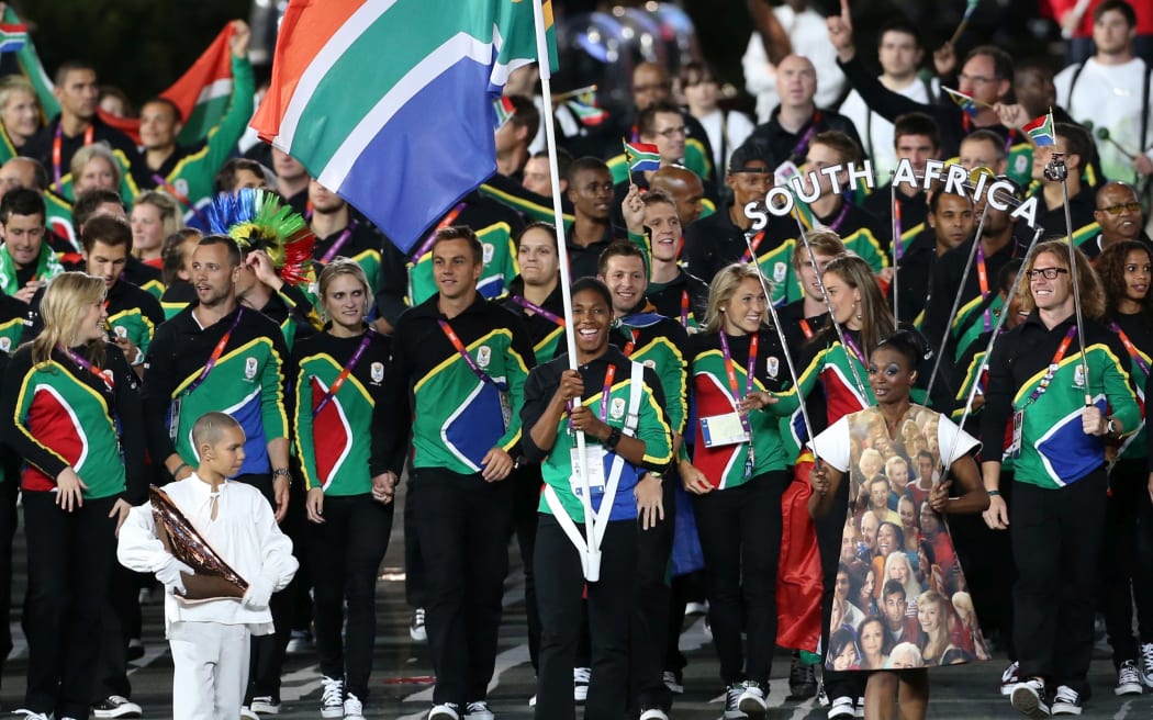 Caster Semenya carries the South African flag at the opening ceremony of the London  Olympics in 2012.