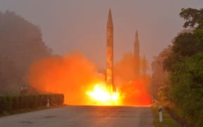 This undated file photo released by North Korea's official Korean Central News Agency (KCNA) on July 21, 2016 shows a missile fired during a drill by Hwasong artillery units of the Strategic Force of the Korean People's Army.