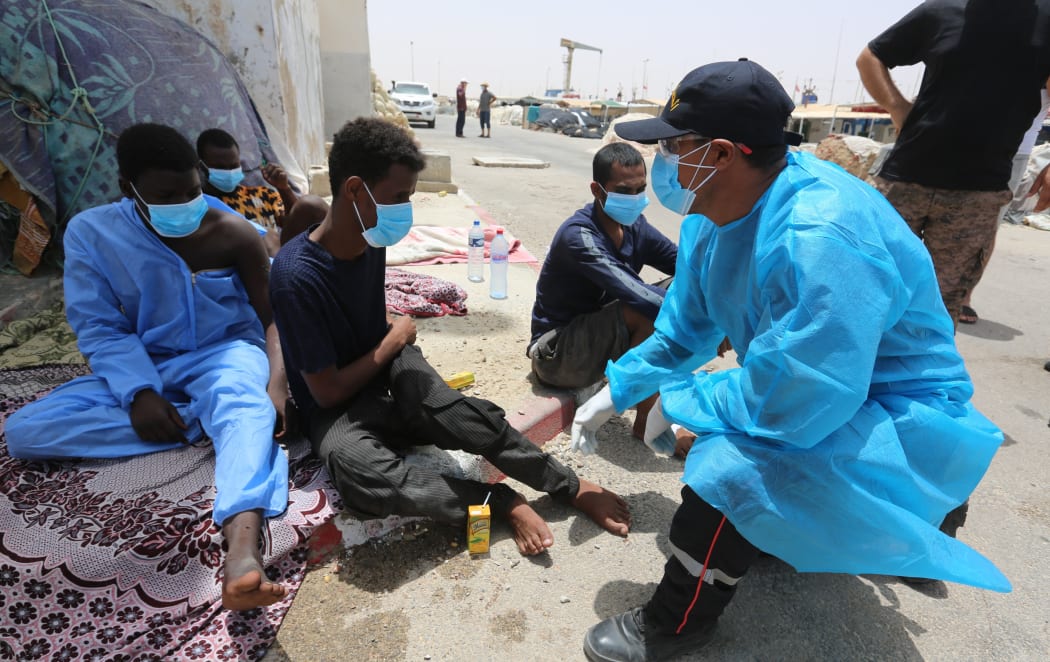 MEDENINE, TUNISIA - JUNE 27: Tunisian naval forces rescue 178 migrants from the Mediterranean after the boats transporting them broke down while trying to reach Europe, in Tunisia on June 27, 2021. Two bodies were recovered