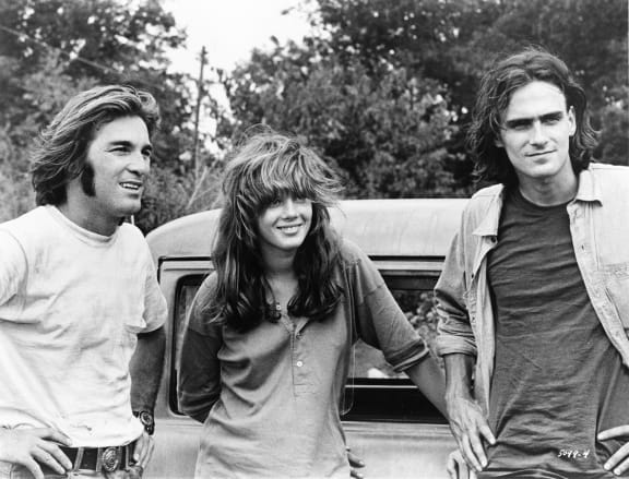 Beach Boy Dennis Wilson, Laurie Bird (known only as “The Girl” because those were the days) and singer/songwriter James Taylor in Two-Lane Blacktop