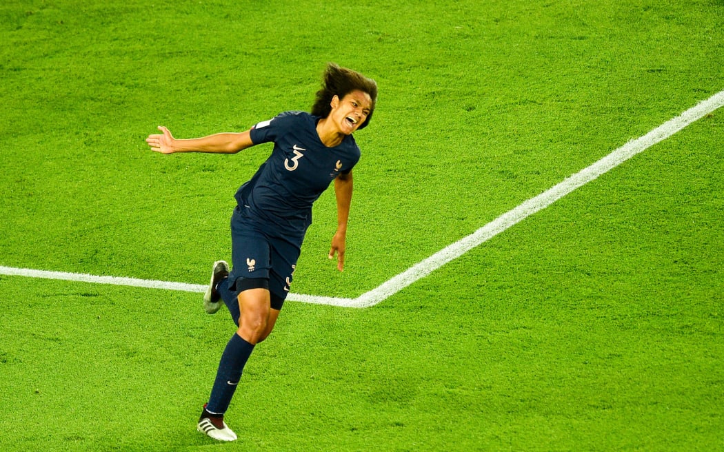 Wendie Renard celebrates scoring for France during the 2019 World Cup.
