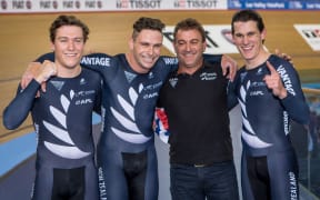 The New Zealand sprint track cycling team of Ethan MIitchell, Eddie Dawkins, Anthony Peden (coach) and Sam Webster celebrate victory at the world champs in London.