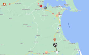 Road closures in Northland on Monday. The black symbols show the closure of State Highway 1 at the Brynderwyn Hills and again at Mata, while the red exclamation mark shows the closure of Paparoa-Oakleigh Road.