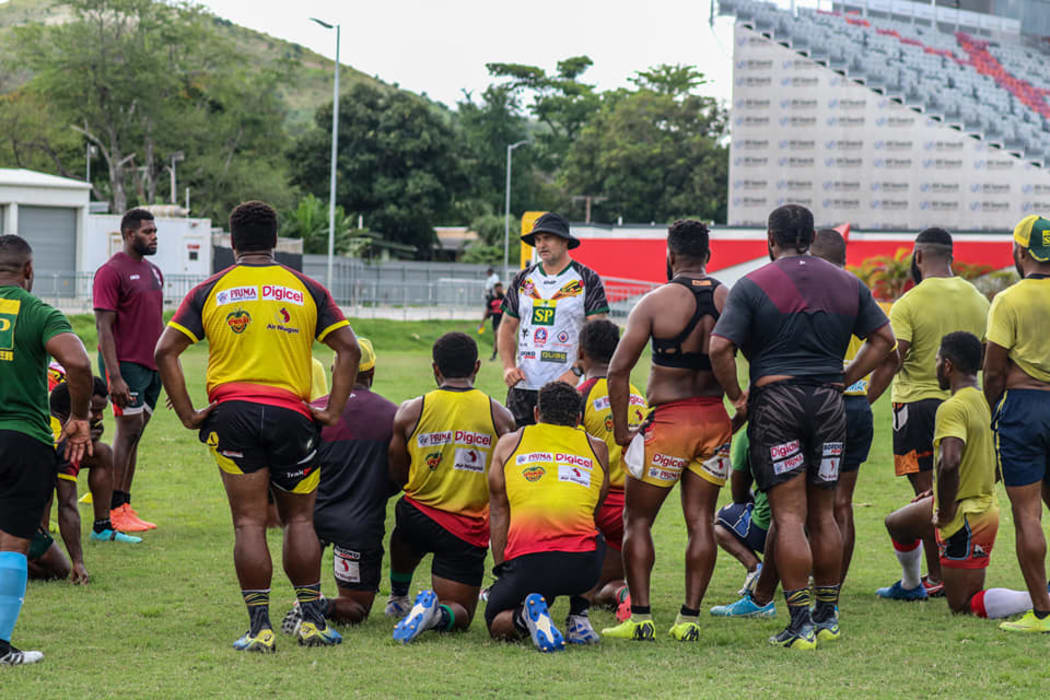PNG Hunters coach Matt Church briefs training squad.