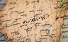 Closeup Selective Focus Of Wisconsin State On A Geographical And Political State Map Of The USA.
