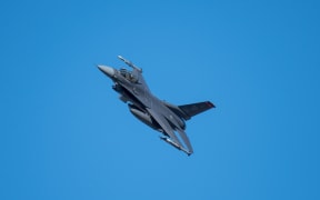 23 February 2022, Rhineland-Palatinate, Spangdahlem: An F-16 fighter aircraft flies over the Eifel near Spangdahlem.