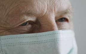 Senior man with medical mask. Prevention of the coronavirus Covid-19 spread.