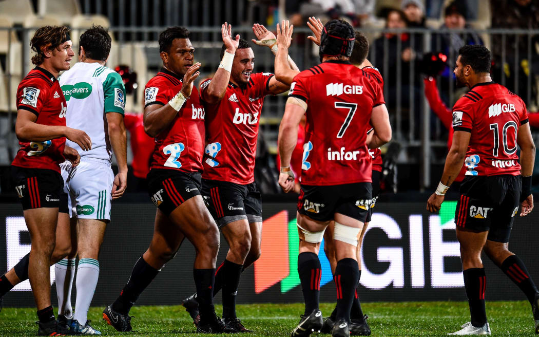 Crusaders celebrating a try scored by Seta Tamanivalu