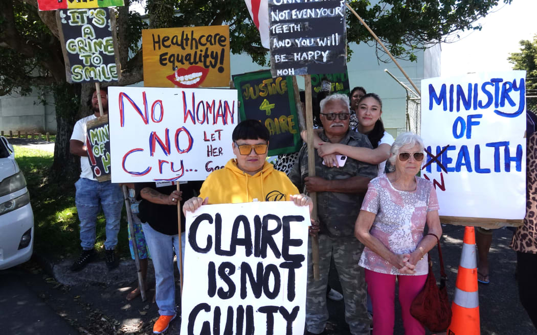 Supporters of Claire Wihongi-Matene line the street outside Kaikohe courthouse.
