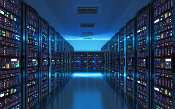 Data storage and cloud computing computer service business concept, showing a server room interior in a data centre.