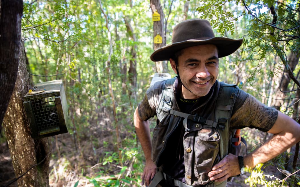 Ariki Baldwin, one of about 30 workers in charge of checking the traps once a month.
