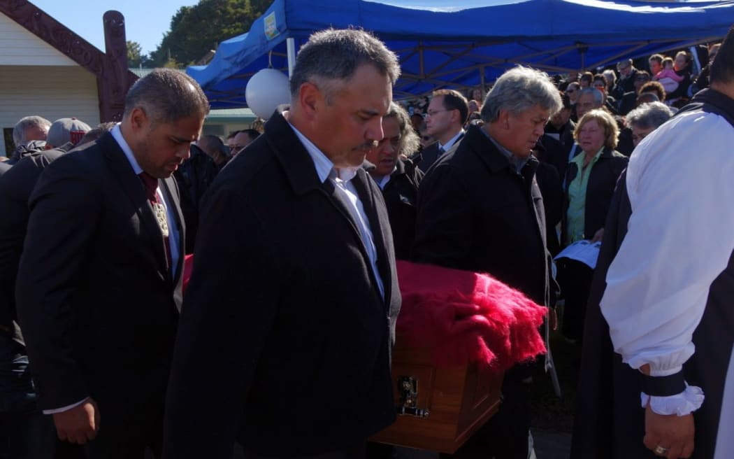 Erima Henare's coffin is carried from motatau Marae after his funeral service.