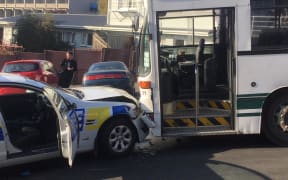 The police car collided with an Otago Road Services school bus.