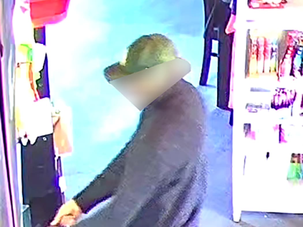 CCTV image of a man in relation to an ongoing homicide investigation in Northland. The images were edited by NZ Police around the man's face before publication by media.