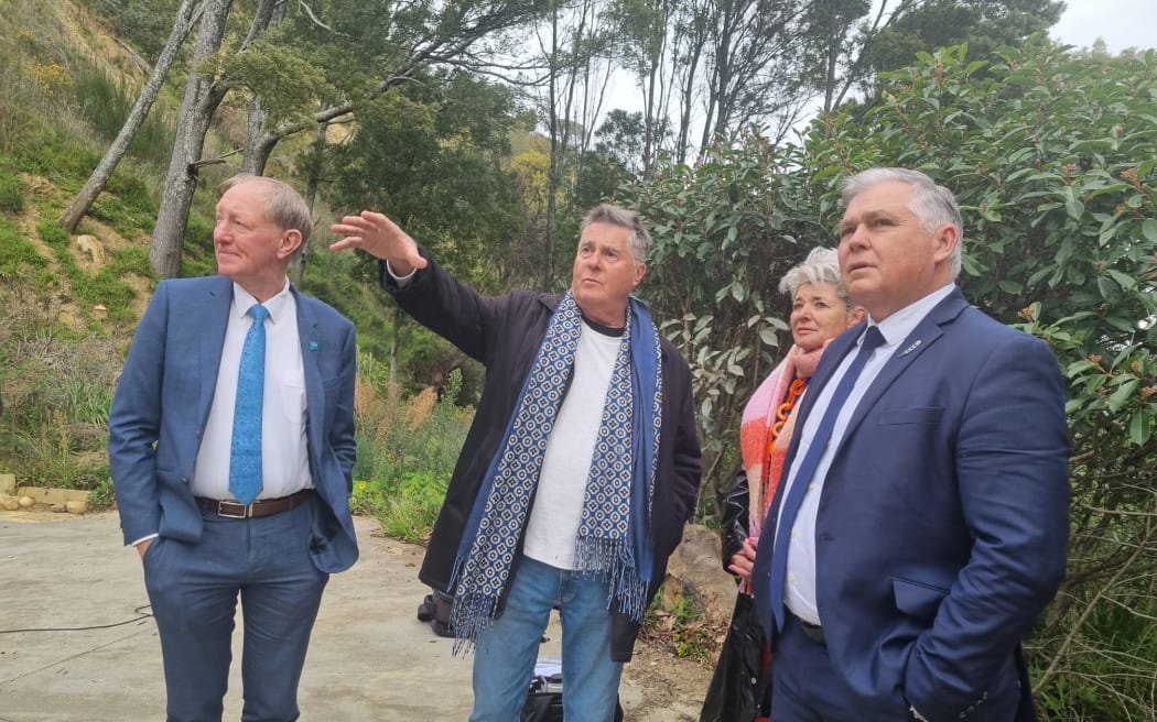 Nelson red-stickered homeowners Geoff Moffett and Julie Ambrose meeting Emergency Managment Minister Mark Mitchell and Nelson Mayor Nick Smith at their property in Moana Ave, which is eligible for a buyout.
