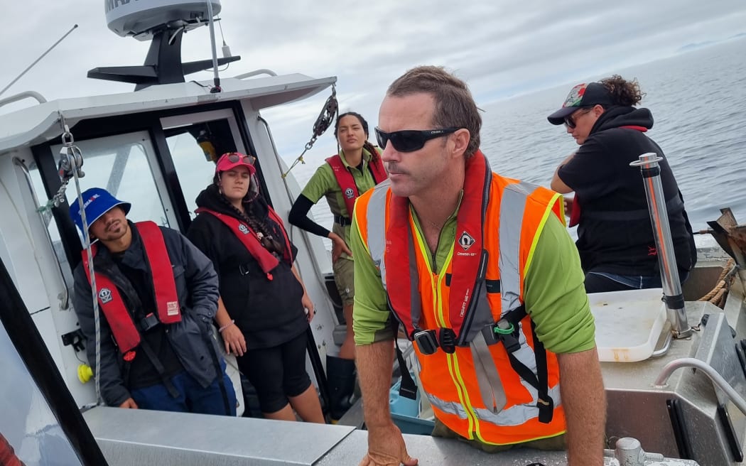 DOC Marine Reserves Ranger Stew Robertson in Tasman Bay with mana whenua iwi members helping to develop a Marine Cultural Health Indicator Framework for assessing the health of the marine environment.