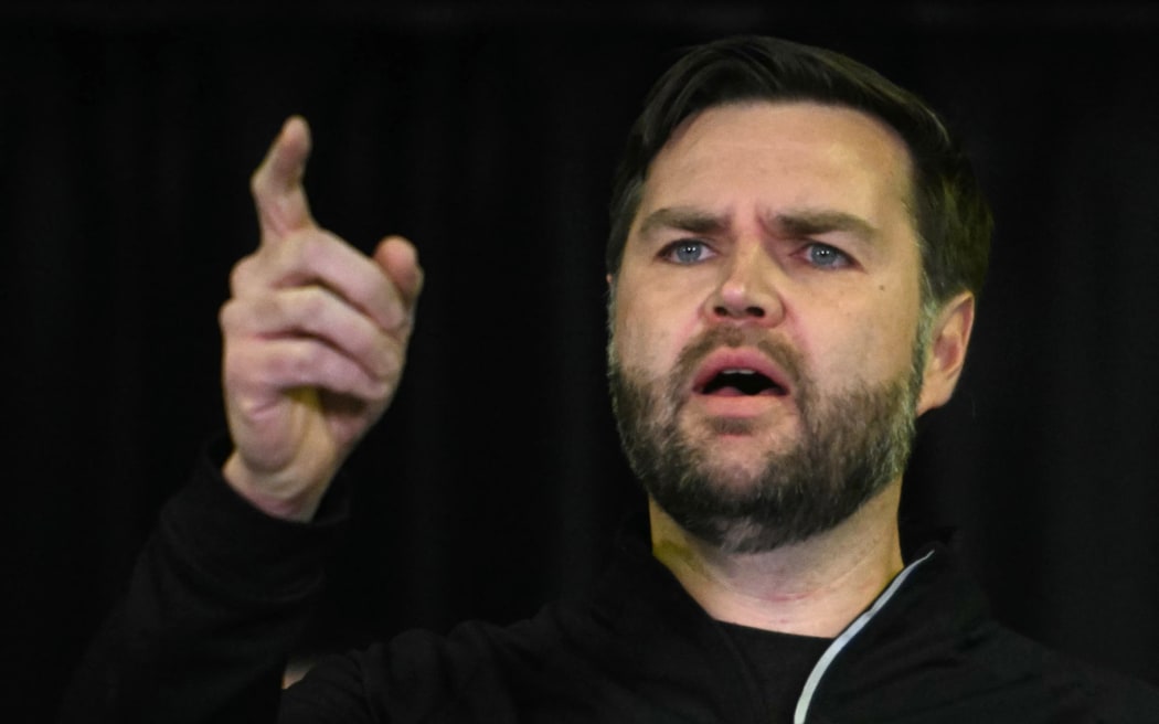 US Vice President JD Vance speaks at the US military's Pituffik Space Base in Greenland on March 28, 2025. The visit is viewed by Copenhagen and Nuuk as a provocation amid President Donald Trump's bid to annex the strategically-placed, resource-rich Danish territory. (Photo by Jim WATSON / POOL / AFP)