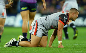Tuimoala Lolohea after his knee injury in Melbourne, Australia. Anzac Day, Monday 25 April 2016. © Copyright Image: Jeff Crow / www.photosoprt.nz