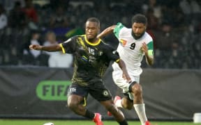 Solomon Kings FC's William Komasiand PNG Hekari FC's Ati Kepo OFC Pro League 2026, Solomon Kings FC v PNG Hekari FC, Olympic Park Melbourne, Sunday 22 February 2026. Photo: Hamish Blair / www.phototek.nz